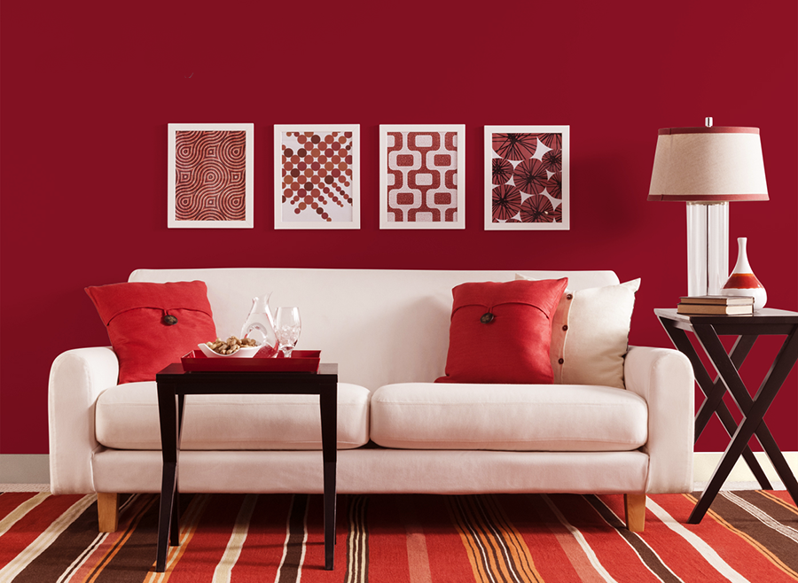 Thiết kế phòng khách gam màu đỏ kết hợp với sofa trắng cho gia chủ mệnh Hỏa
